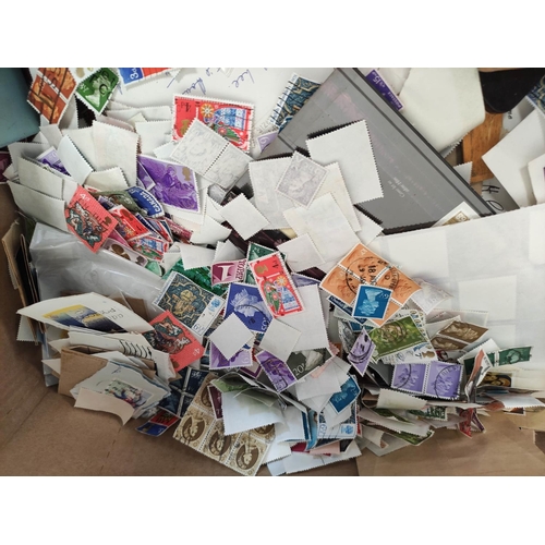 406 - Box containing a large quantity of mixed World postage stamps.