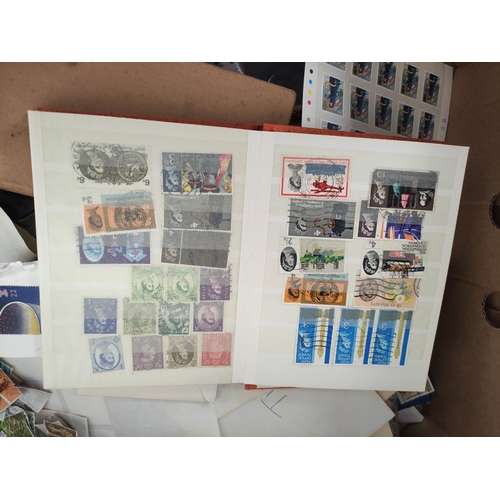 406 - Box containing a large quantity of mixed World postage stamps.