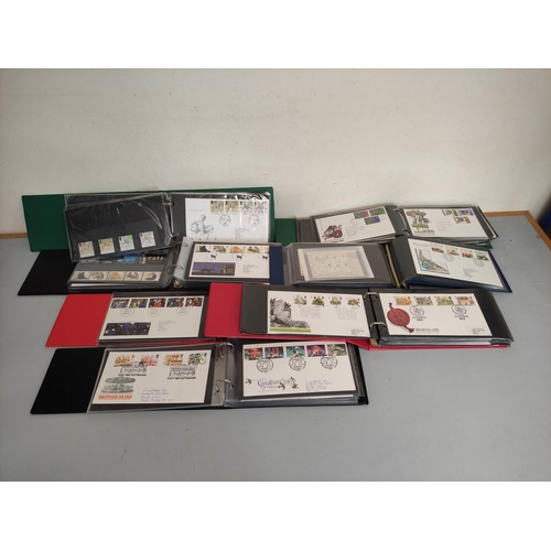 409 - Box containing a large quantity of presentation packs and first day covers dating from the 1960s-90s... 