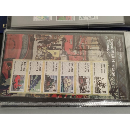 411 - Two albums of c2010s British mint presentation packs postage stamp sets comprising of 211 first clas... 