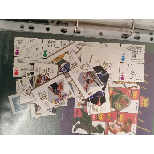 413 - Album of c2000s-2010s British mint presentation packs postage stamp sets comprising of 112 first cla... 