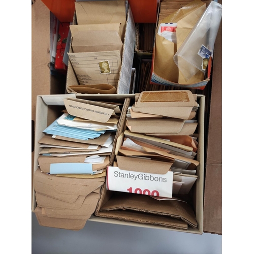 415 - Box containing a large quantity of mixed World postage stamps contained within envelopes.