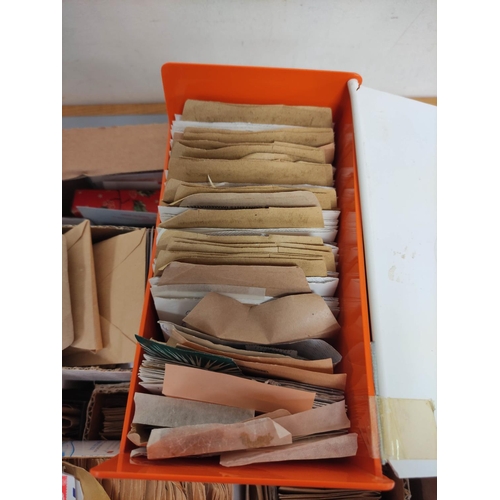 415 - Box containing a large quantity of mixed World postage stamps contained within envelopes.