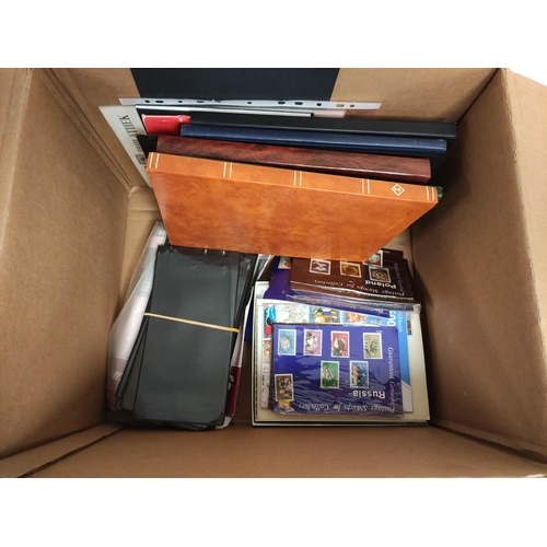 416 - Box containing mixed world postage stamp albums and album sheets.