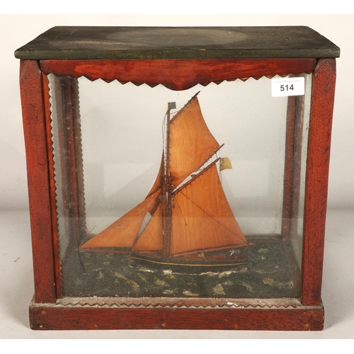 514 - Model yacht in glass case, 38 x 23 x 36cm