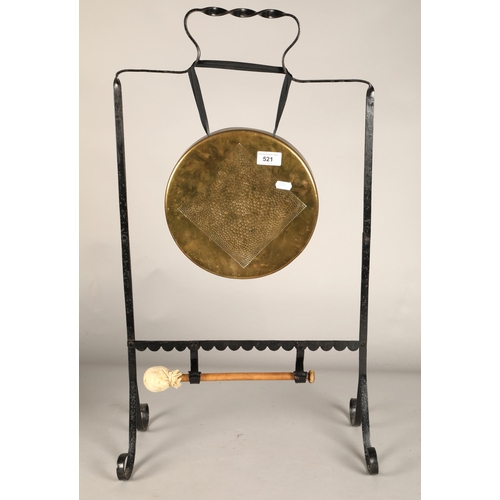 521 - Free standing gong with beater, 76 cm high