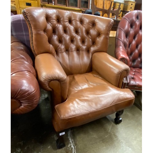 567 - Brown leather button back armchair, H 103cm, W 70cm, D 75cm