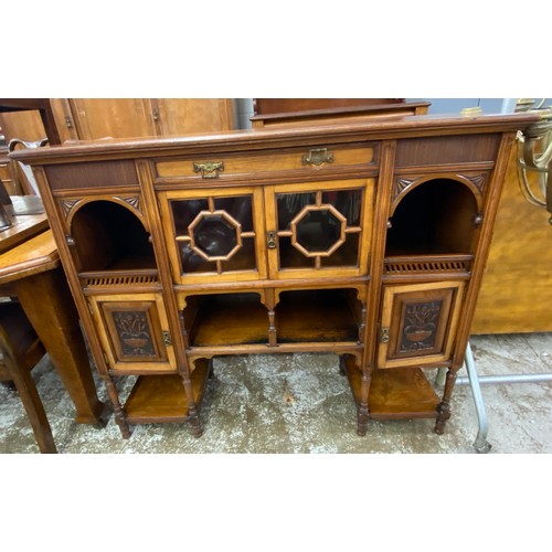 565 - Edwardian side cabinet with glazed doors and ornate carved designs,  dimensions: H 104cm, W 121cm, D... 