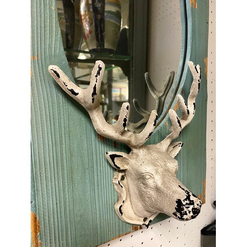 223 - Distressed look stag design wall mirror, 50 x 28cm