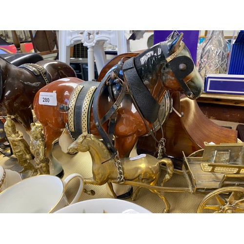 280 - Mahogany mantel clock, various horse figures, decorative brass figures