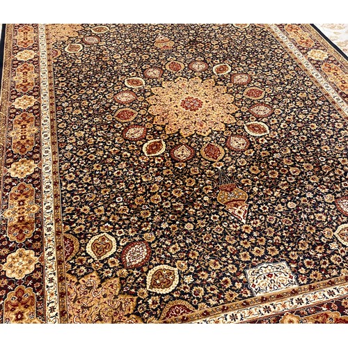 573 - Red and cream on black ground Persian style woolen carpet, 337 x 250 cm