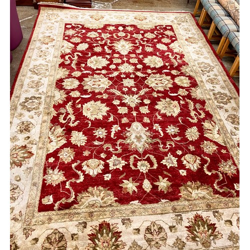 574 - Red and cream GH Firth Ltd hand knotted Wool pile carpet, 430 x 307cm