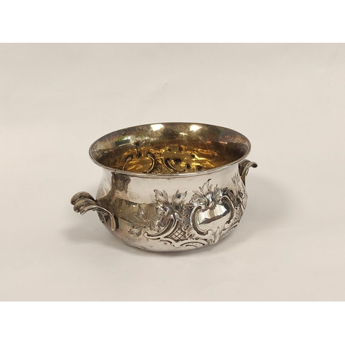 103 - Silver porringer embossed with scrolls, with similar handles by W.K Reid 1848, 191g, 6oz.