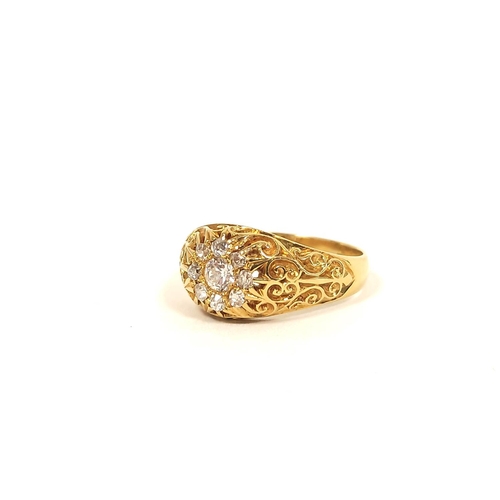 120 - Diamond ring in pierced and champlevé, 18ct gold, dated 1909. 5.3g. Size 'N'