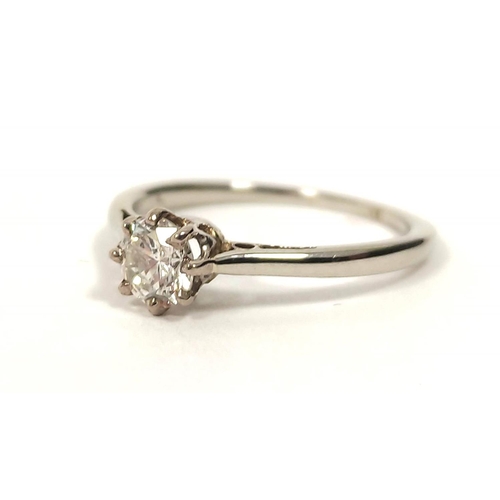 124 - Diamond solitaire ring in 'platinum'. Size 'H'