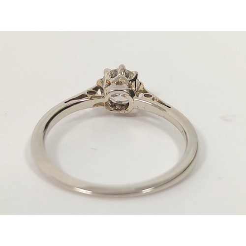 124 - Diamond solitaire ring in 'platinum'. Size 'H'