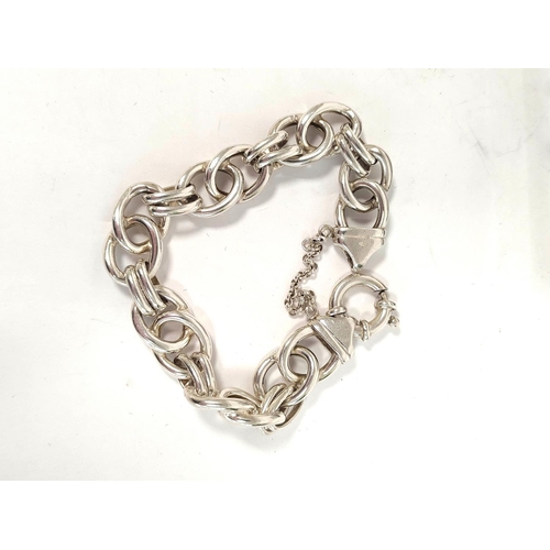 129 - Silver heavy bracelet, three others and other items.