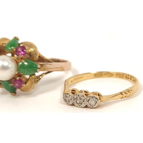 131 - Jade pearl and ruby ring in gold '14k' and a three stone diamond ring '18ct platinum' (2)