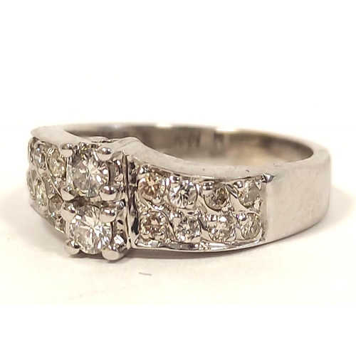 137 - Diamond ring with slant and band of brilliants in white gold '18k' . Size 'L½', 5g