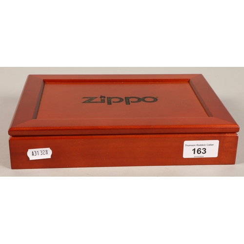 Eight limited edition Zippo lighters, some with mother of