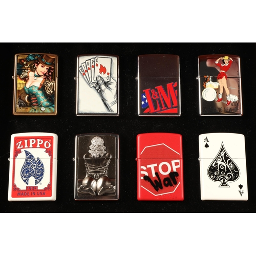 164 - Eight various limited edition Zippo lighters in Zippo display case including 'Stop War', carved lady... 