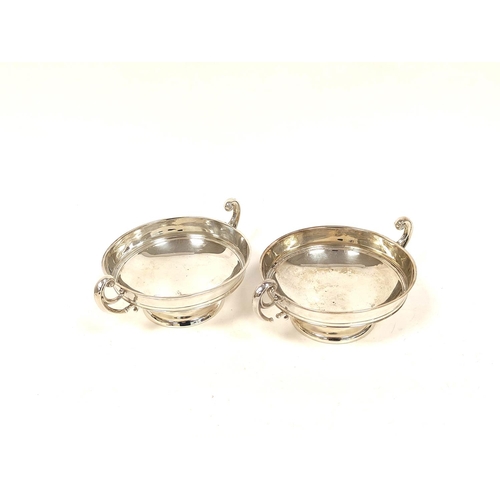 141 - Two silver, two handled, shallow bowls by Huttons, Birmingham 1906. 220g. 7oz.