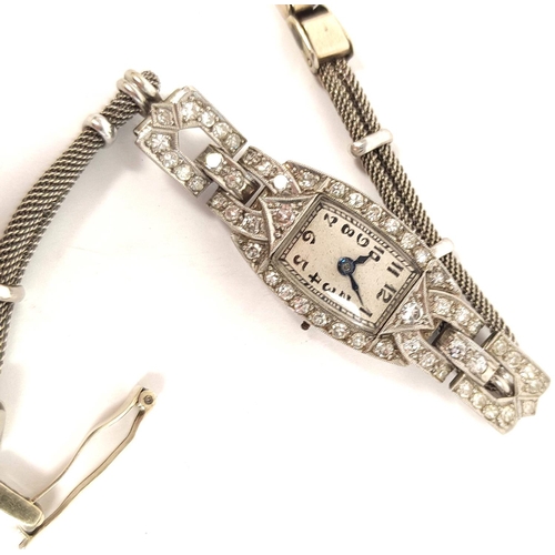 144 - Diamond set evening watch 'all platinum' on 9ct gold bracelet 12.9g and two other items.