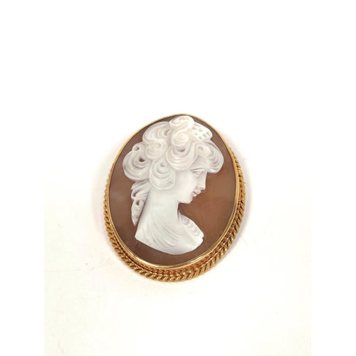 145 - Cameo brooch with portrait of a girl, 9ct gold. Also a simulated pearl necklace with yellow metal cl... 