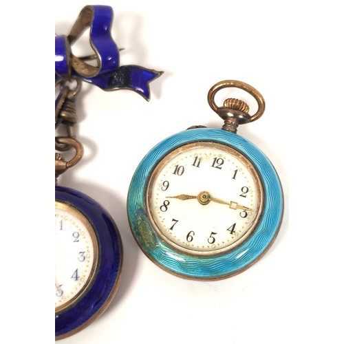 150 - Two Geneva cylinder watches in enamelled silver cases, pale and dark blue with bow.