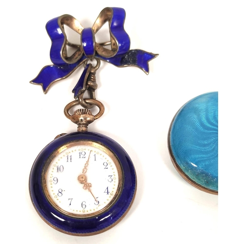 150 - Two Geneva cylinder watches in enamelled silver cases, pale and dark blue with bow.