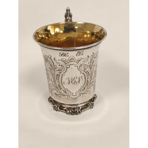 92 - Silver christening mug with engraved scrolls upon similar embossed foot, 1840. 155g, 5oz.