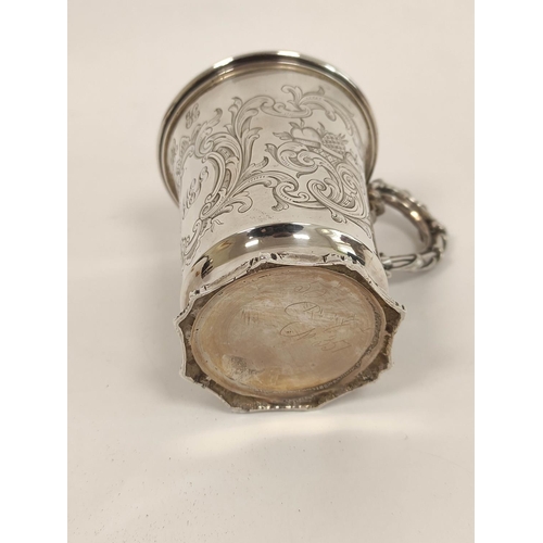 92 - Silver christening mug with engraved scrolls upon similar embossed foot, 1840. 155g, 5oz.