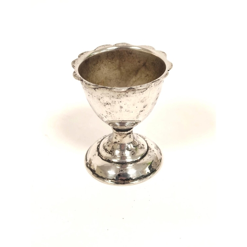 95 - Silver small dish, a bottle cap, an egg cup and nine napkin rings, various. 314g.