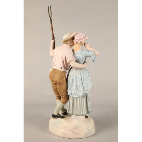 246 - Ceramic figure of a farming couple, height approx 60cm