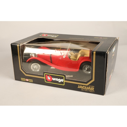 254 - Four boxed Burago models including Ferrari, Jaguar and Porsche