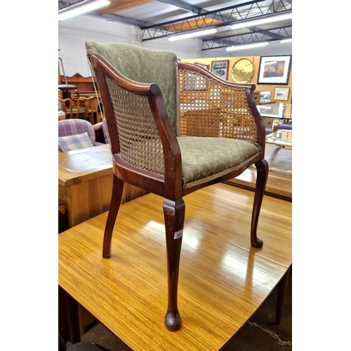 604 - Mahogany bergere armchair