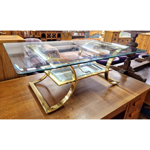 606 - Glass topped brass frame coffee table with mirrored shelf