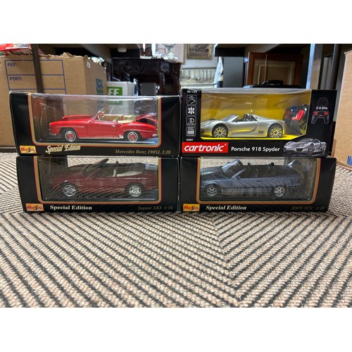 359 - Four boxed Maisto 1:18 scale model cars including Porsche 918 Spyder, Mercedes Benz 190SL, etc