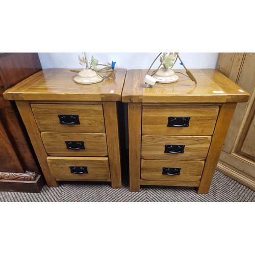 509 - Pair of contemporary oak three drawer bedside cabinets, 40 x 50 x 62 cm each (2)