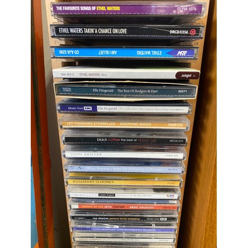 475 - Three contemporary CD racks with CDs