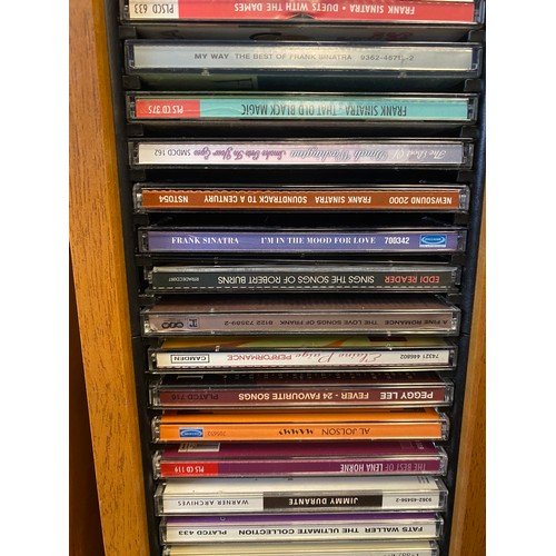 475 - Three contemporary CD racks with CDs