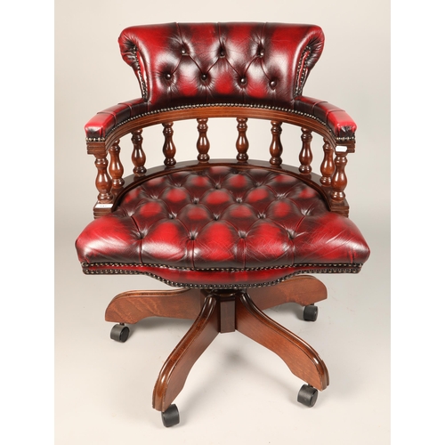 547 - Red leather Chesterfield-style captain's chair, approx. dimensions H 80cm, W 60cm, D 50cm