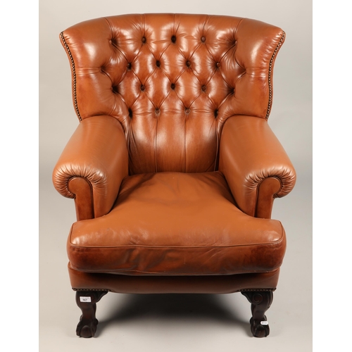 567 - Brown leather button back armchair, H 103cm, W 70cm, D 75cm