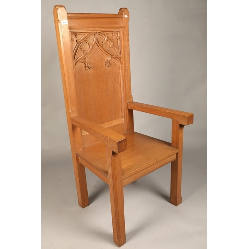 570 - Oak church chair with decoration in relief (Church of Scotland provenance), H 135cm, W 54cm, D 62cm