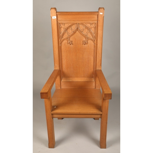 570 - Oak church chair with decoration in relief (Church of Scotland provenance), H 135cm, W 54cm, D 62cm