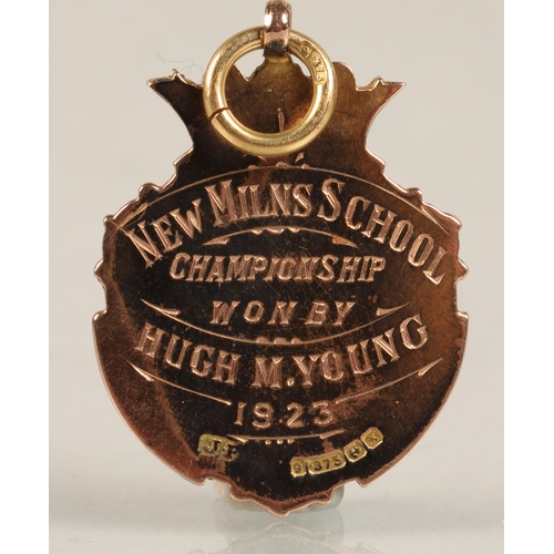 66 - 9ct rose gold badge inscribed 'New Milns School Championship won by Hugh M. Young 1923', 4.3g