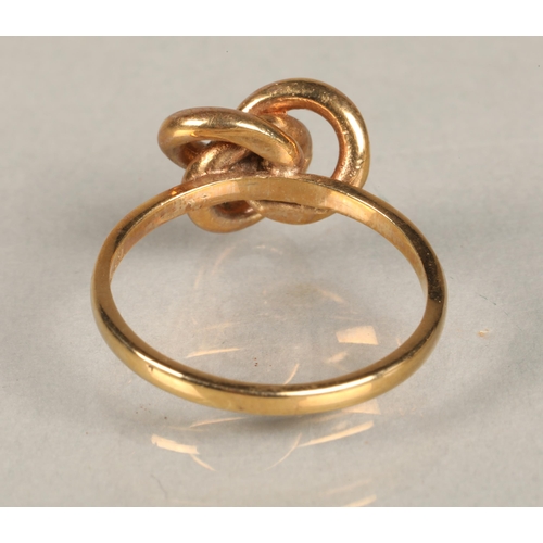 91 - 9 carat gold knot design ring, 3.4 grams, size P