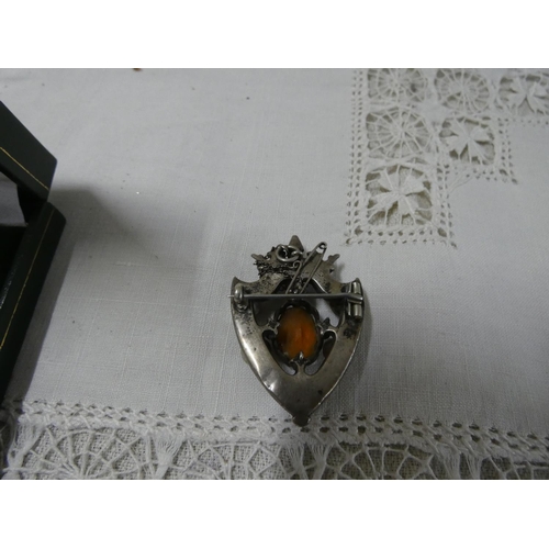 42 - Silver agate brooch and antique Scottish silver brooch.