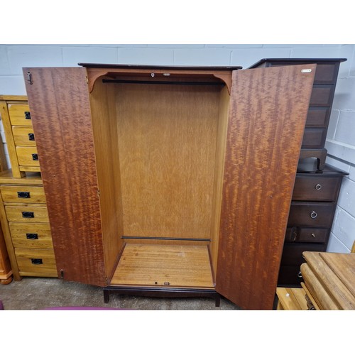 593 - Stag three piece bedroom suite comprising of double wardrobe 177cm x 95cm x 59cm, chest of drawers a... 