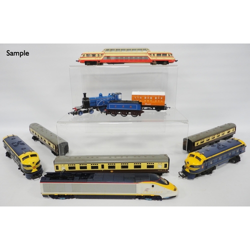 283 - Collection of Tri-ang and Hornby OO gauge locomotives and coaches to include two Tri-ang Railways lo... 